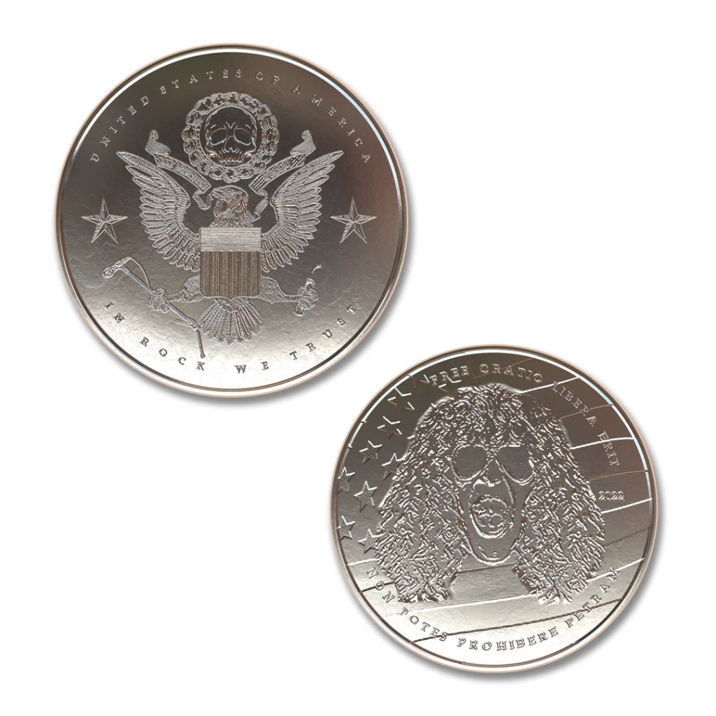Silver Dee Snider commemorative coins with skull and eagle designs in collectible collection