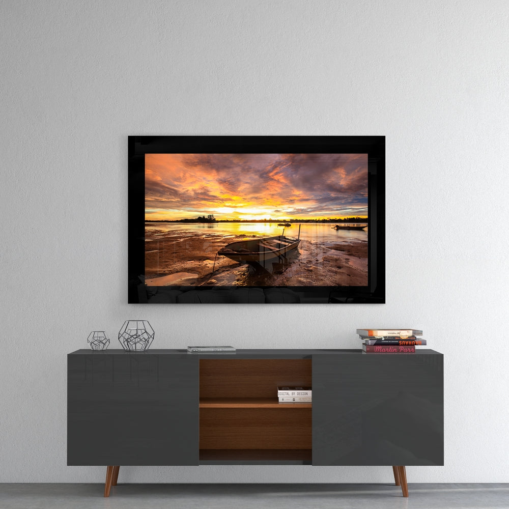 Fiery Dusk Stranded Boat Glass Wall Art