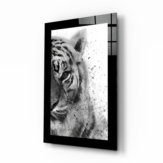Black-framed glass wall art displaying a monochromatic watercolor tiger in profile, mounted at an angle showing shadow depth.