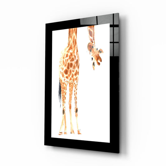 Framed glass wall art displaying a giraffe viewed from behind, shown at three-quarter angle against white background.