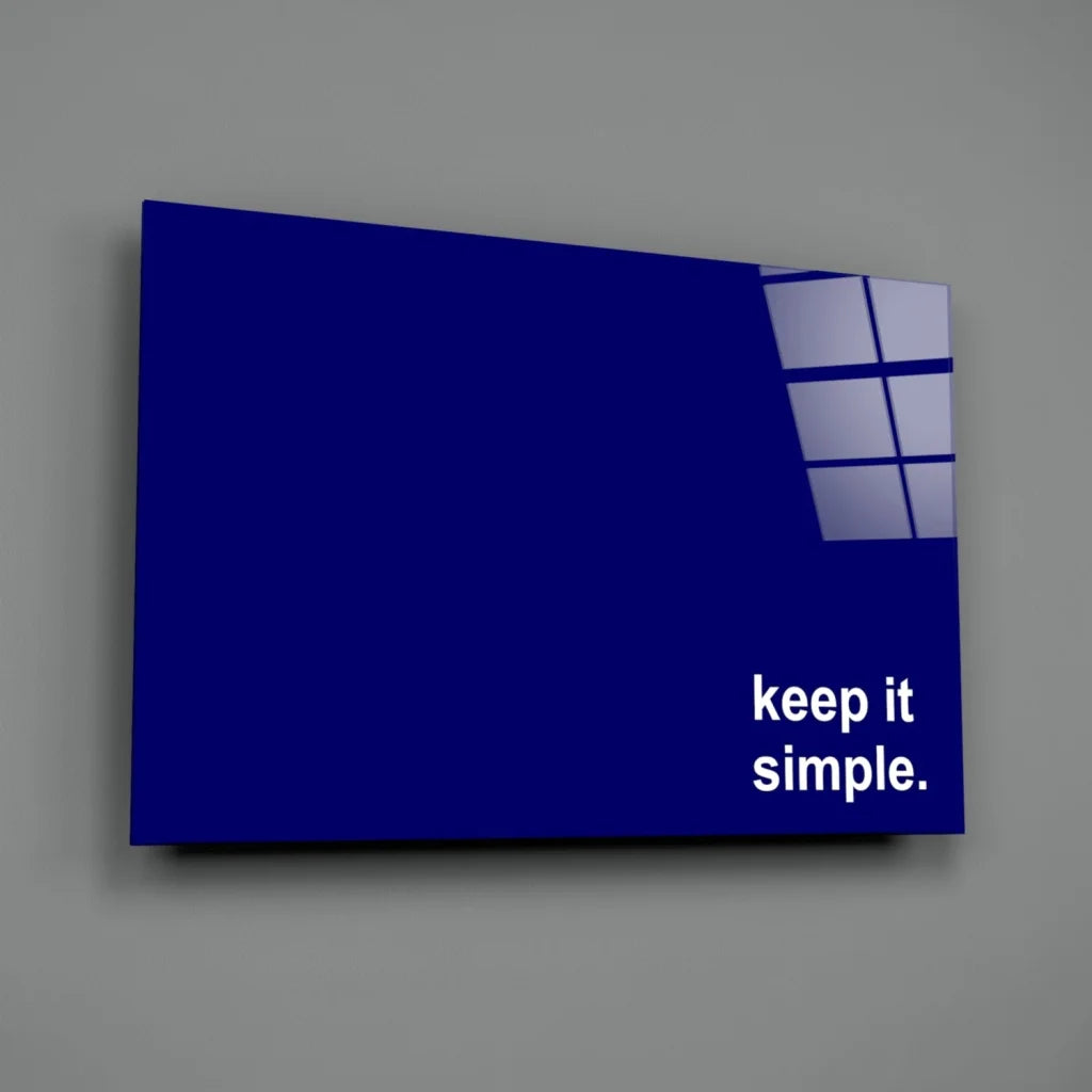 Deep blue minimalist wall art sign with keep it simple text