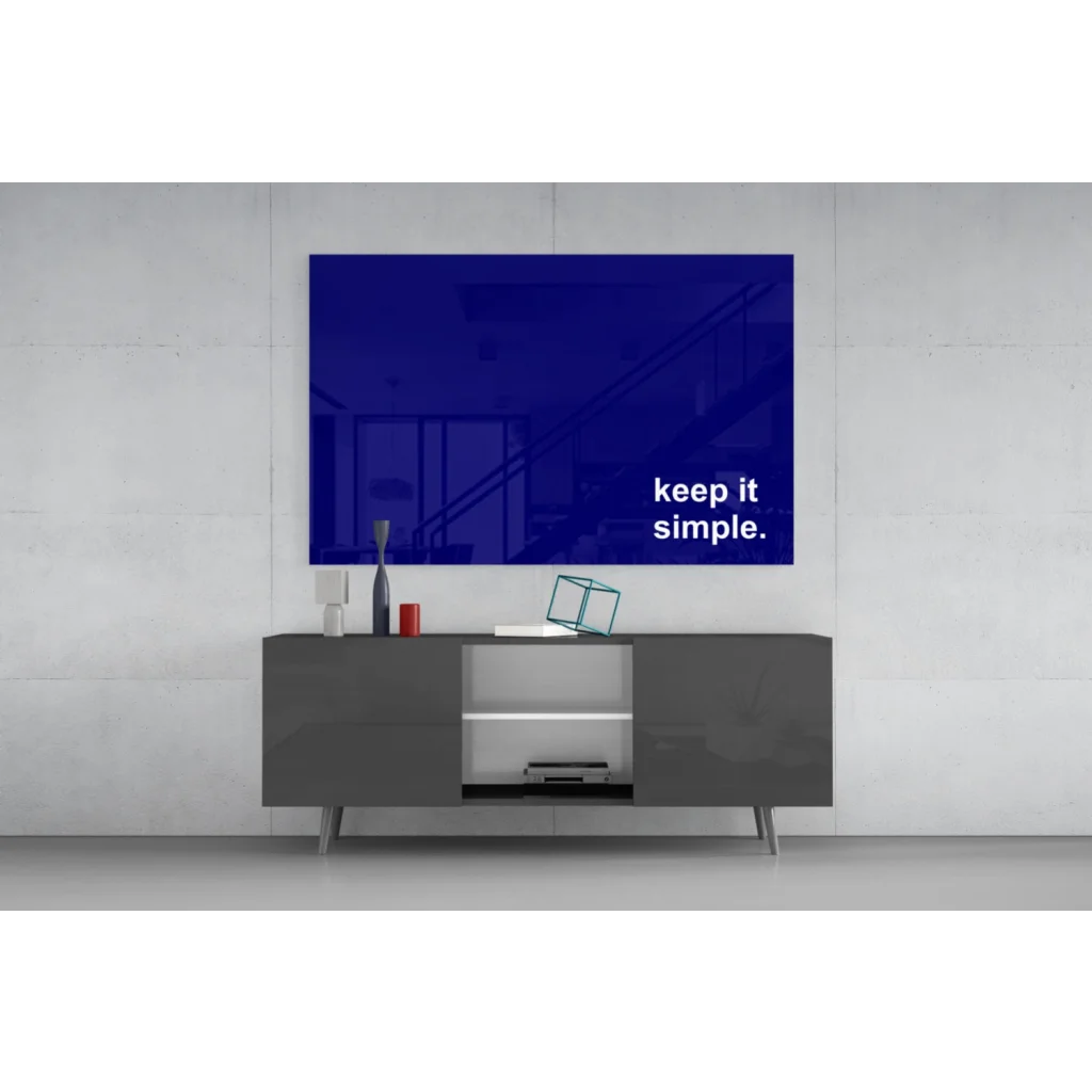 Sleek gray console table with minimalist legs and open shelving wall art