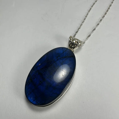 Deep blue oval labradorite sterling silver pendant necklace