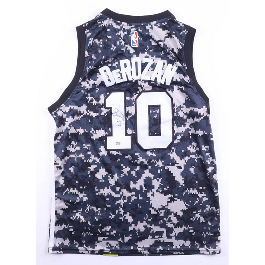 DeMar DeRozan #10 camo basketball jersey displayed in signed Spurs jersey with PSA auth