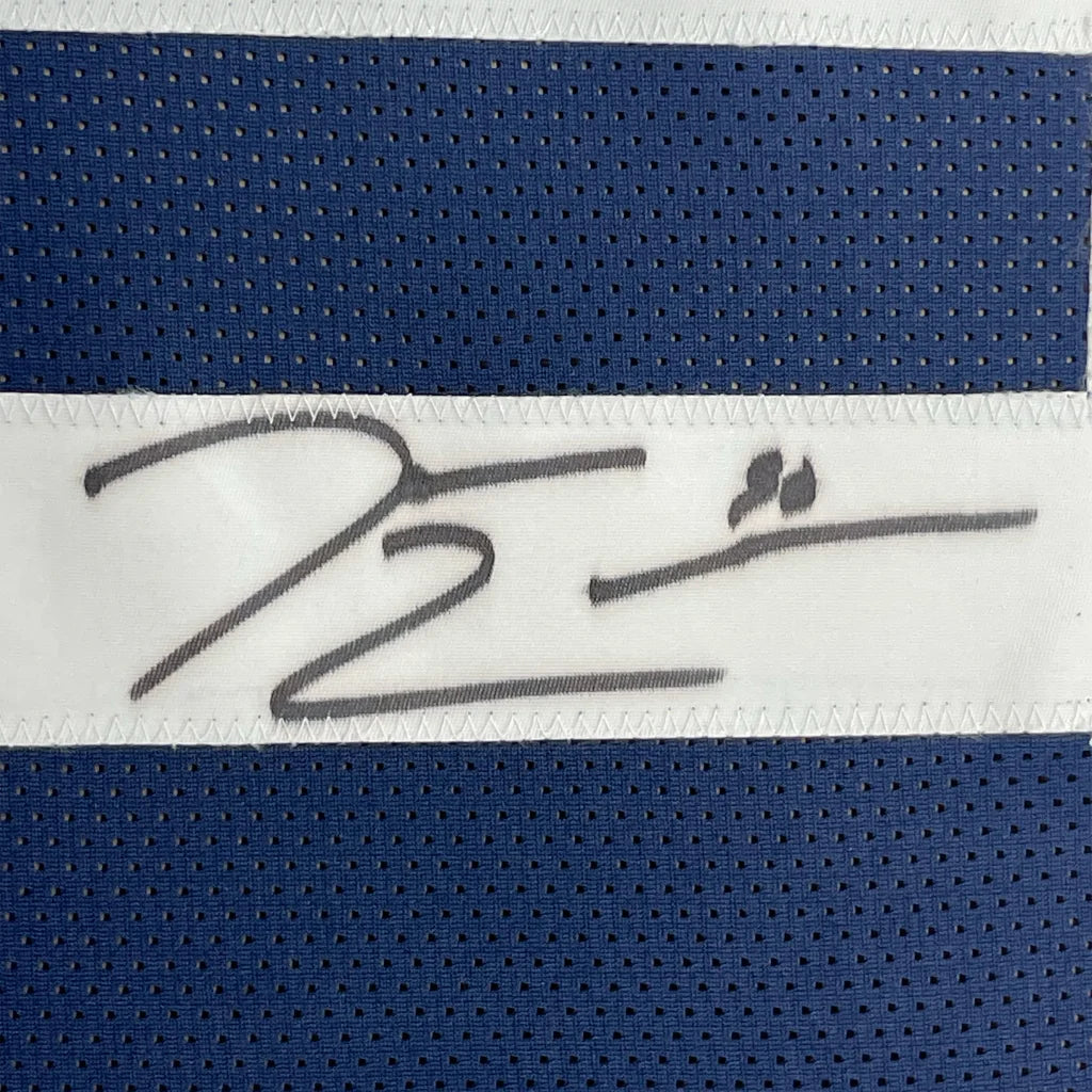 Blue and white athletic fabric with DeMarcus Lawrence signature for Cowboys fan decor