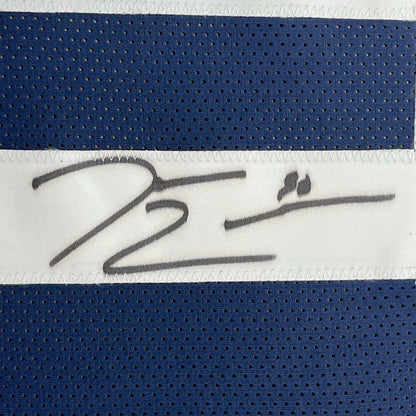 Blue and white athletic fabric with DeMarcus Lawrence signature for Cowboys fan decor