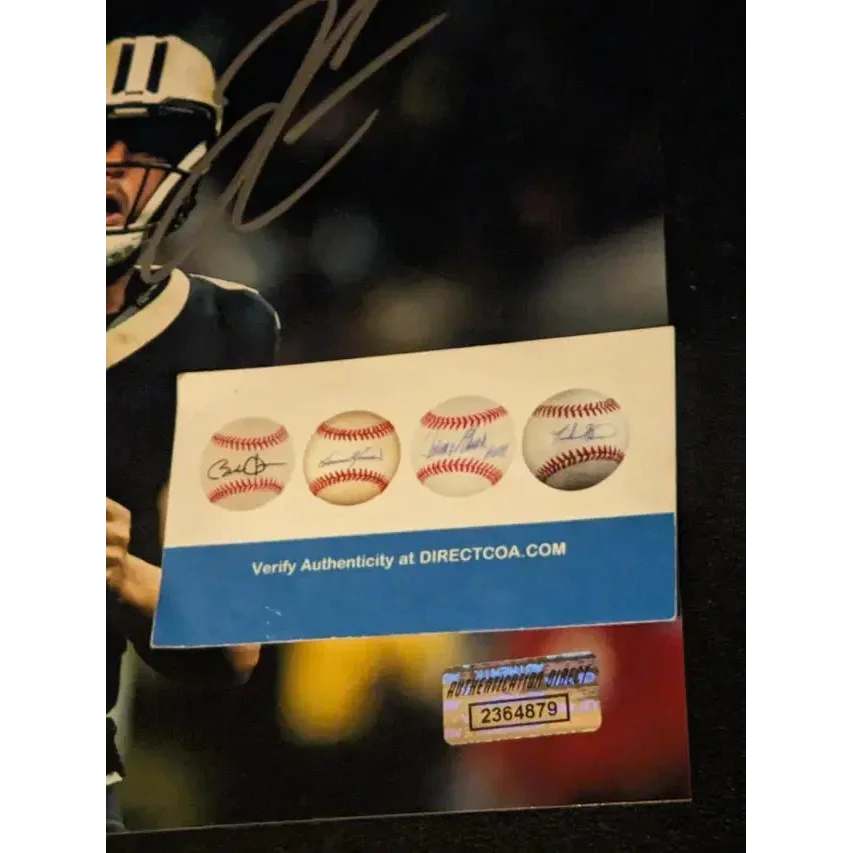 Derek Carr autographed Saints trading card with certificate of authenticity display