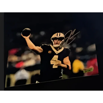 Derek Carr autographed Saints trading card with certificate in black and gold Saints uniform