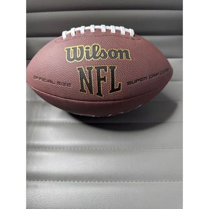 Brown leather Deshaun Watson autographed football with white laces and pink details