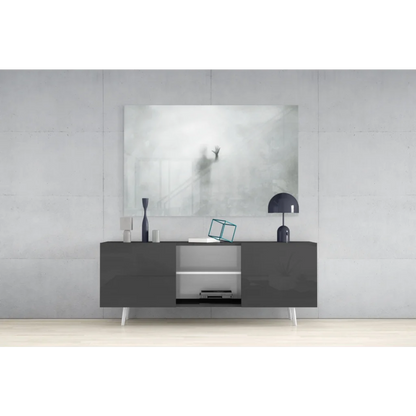 Ethereal hand silhouette glass wall art print with modern matte black sideboard