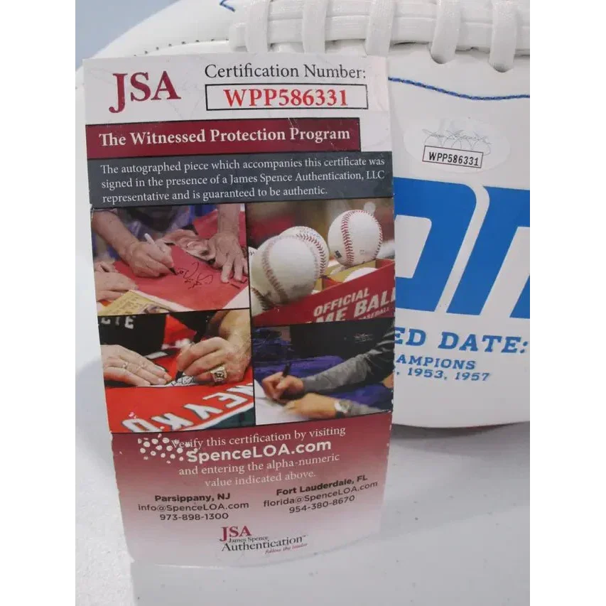 Authentication tag on Detroit Lions signed autographed logo football for proof of authenticity