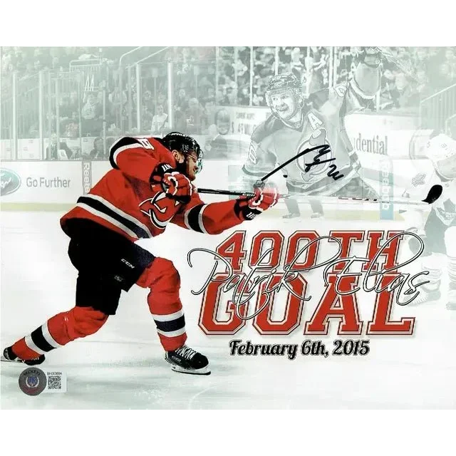 Devils autographed 8x10 photo of player in red jersey shooting puck