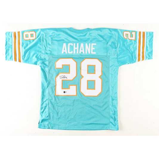 Teal Miami Dolphins signed jersey with white and orange trim featuring De’von Achane