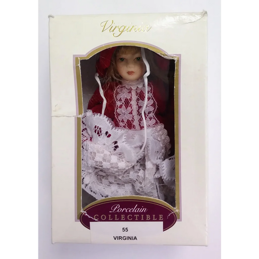 Virginia Porcelain holiday ornament doll in red white lace dress with festive charm