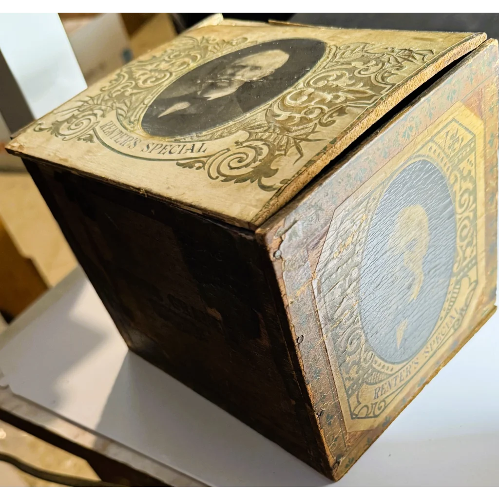 Vintage Americana Treasure cigar box with cube shape and portrait medallions