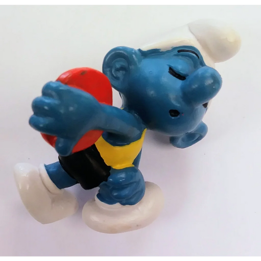 Discus Smurf action figure with red ball, blue body and hat