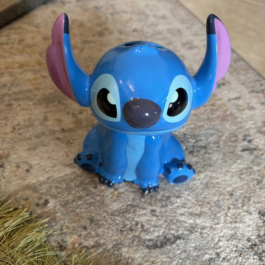 Disney 8-inch Stitch ceramic figure piggy bank with pink ears, blue ceramic body