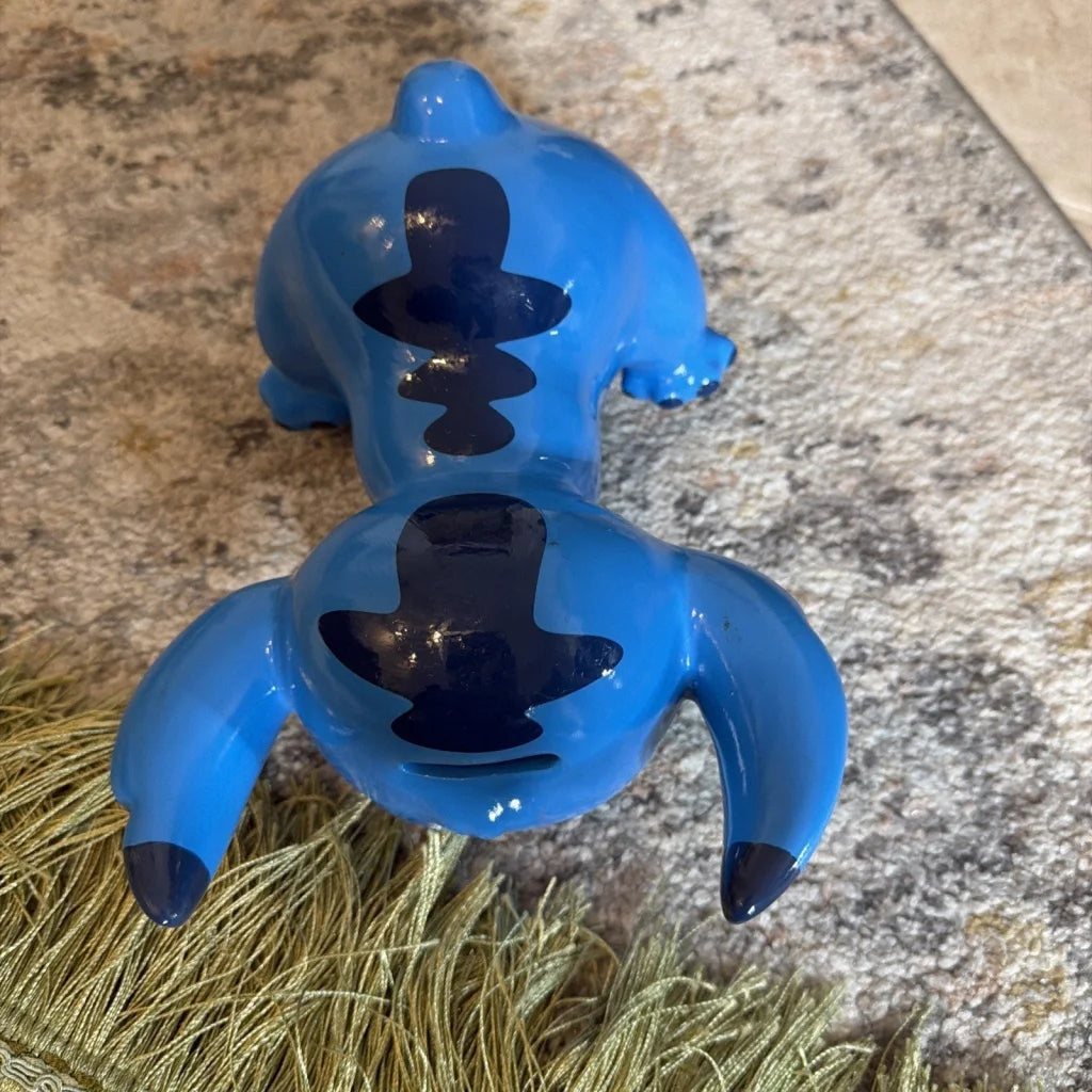 Blue Disney Stitch 8-inch ceramic figure piggy bank with stitched markings