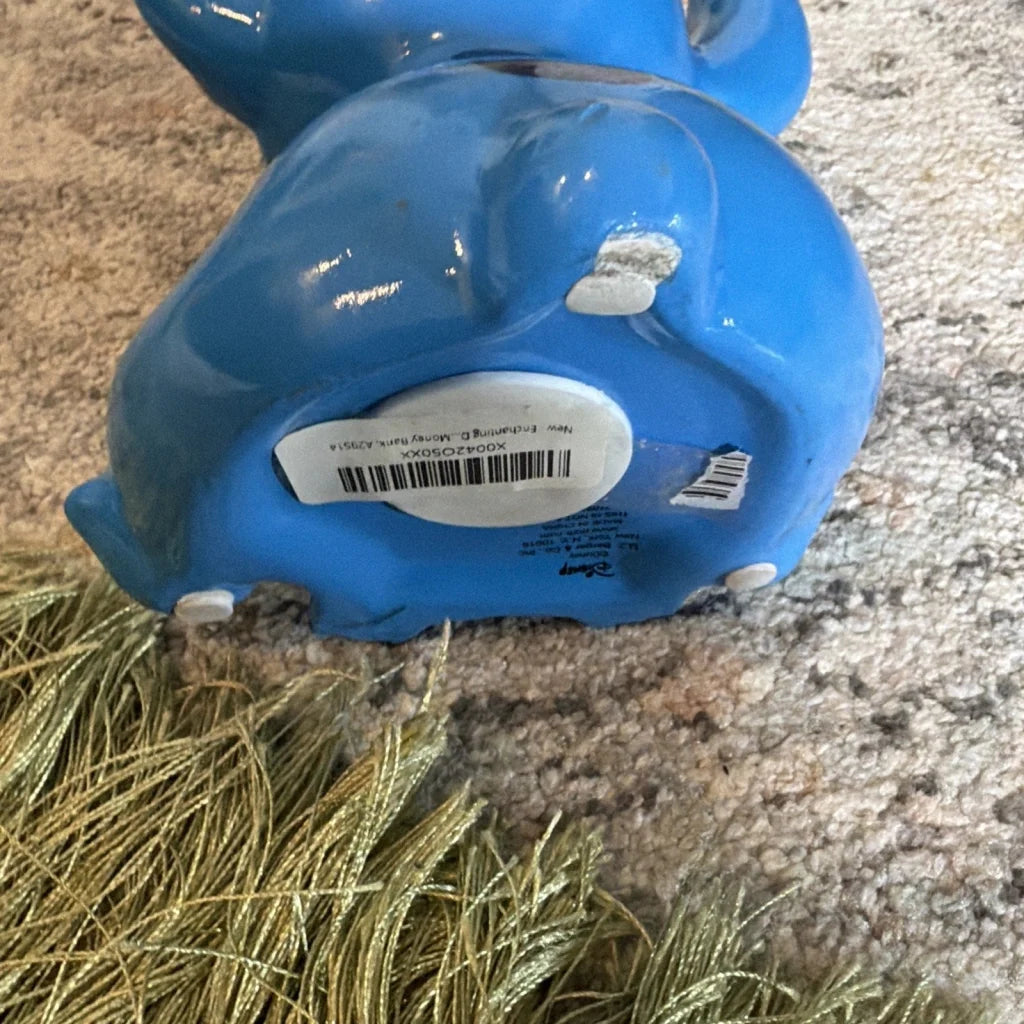Blue Smurf ceramic figure piggy bank with glossy finish and white feet