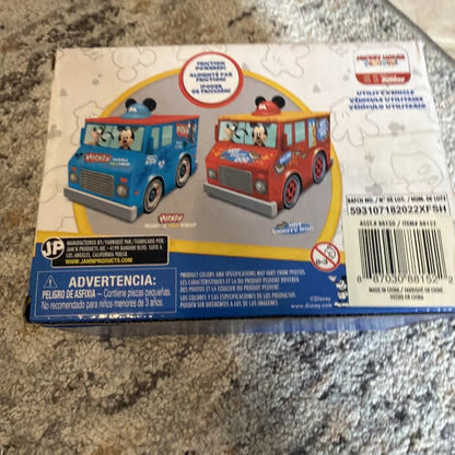 Blue Disney Mickey Mouse mobile skate shop toy vehicle in box with red version