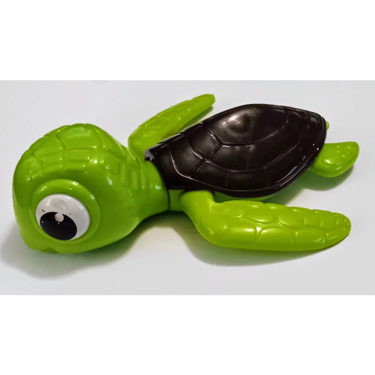 Green Crush Disney Happy Meal toy: plastic turtle with black shell and googly eyes