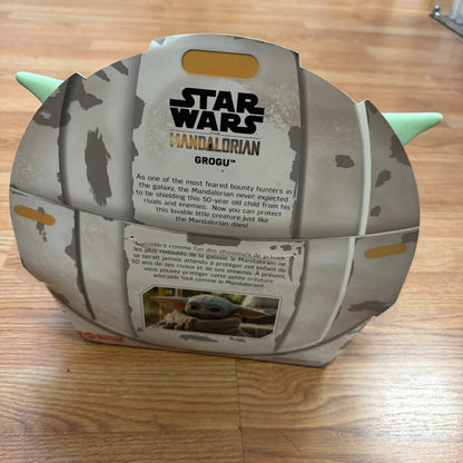 Disney Star Wars Mandalorian Grogu helmet toy packaging, weathered gray green design