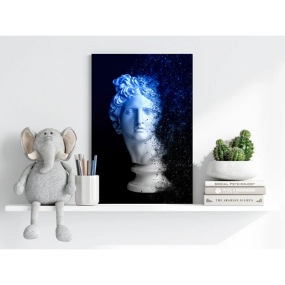 Blue and white marble bust canvas print with dissolving face particles in electric blue sparkle