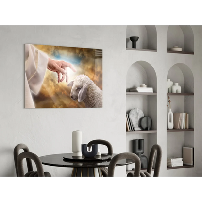 Hand reaching for lamb in Divine Shepherd canvas wall art with golden glow