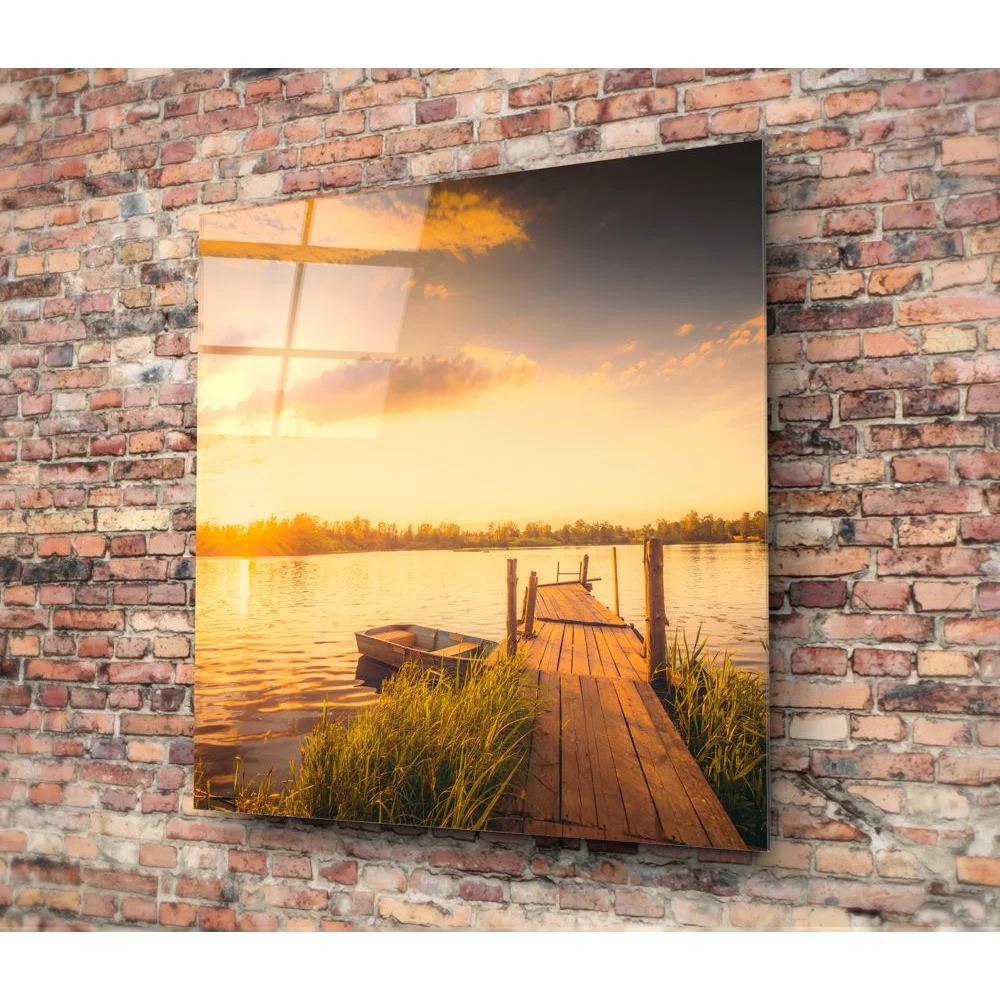 Sunset dock tempered glass art on brick wall with boat