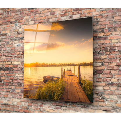 Sunset dock tempered glass art on brick wall with boat