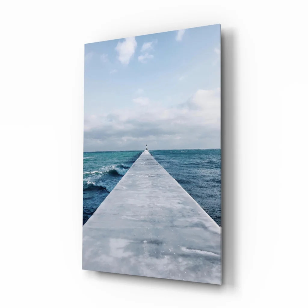 Stunning ocean pier glass wall art canvas print of weathered pier in blue waters