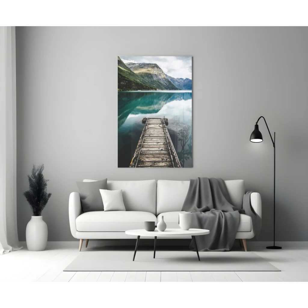 Tranquil dock glass wall art with mountain reflections in turquoise water