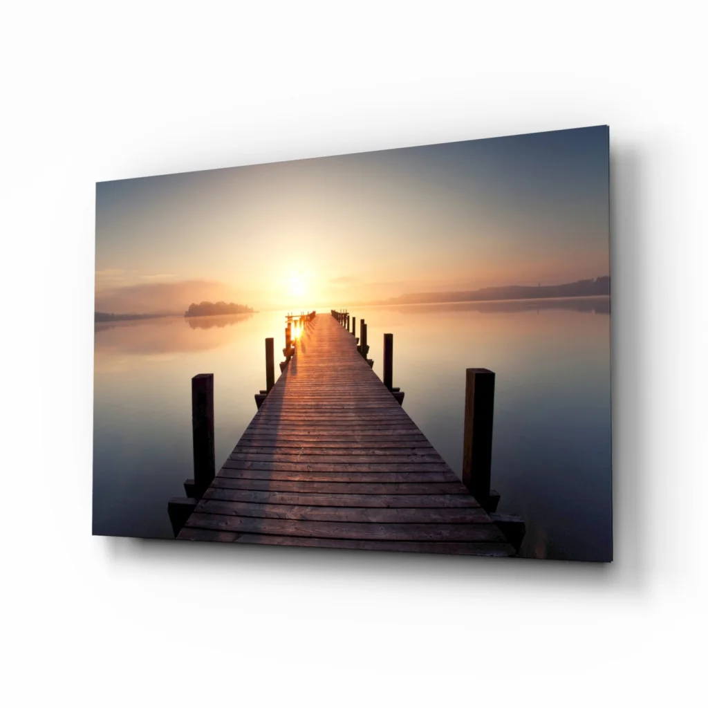 Stunning sunrise pier glass wall art print on serene wooden pier at dawn