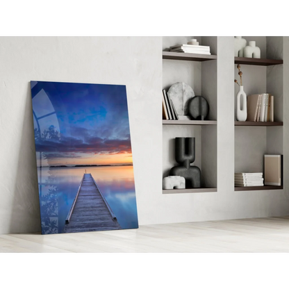 Vibrant sunset pier glass wall art with wooden dock in calm water