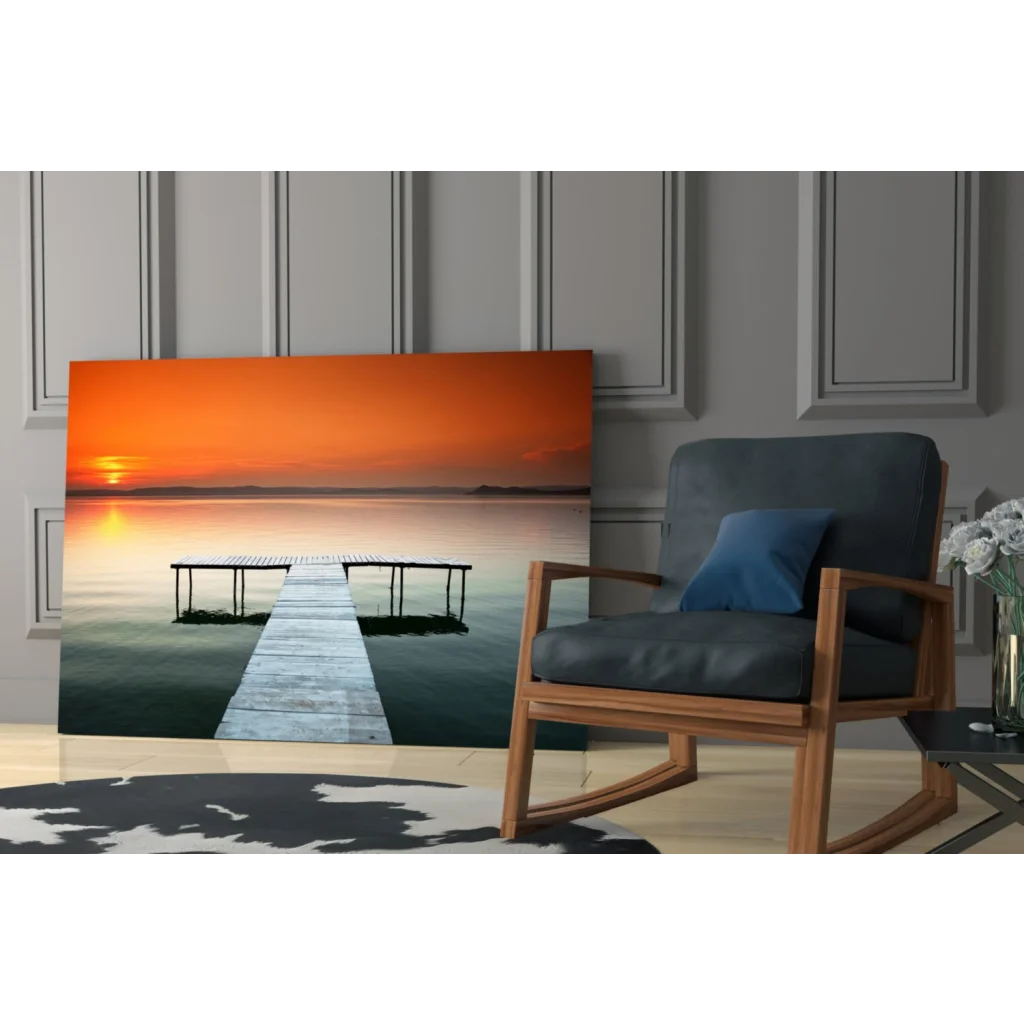 Vibrant orange sunset over wooden pier wall art canvas print
