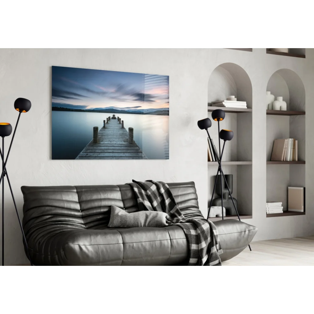 Modern Twilight Pier glass wall art print on sleek dark gray sofa