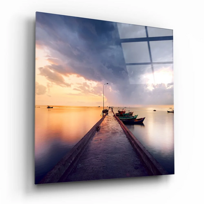 Stunning tempered glass art of serene coastal sunset over water with docked boats