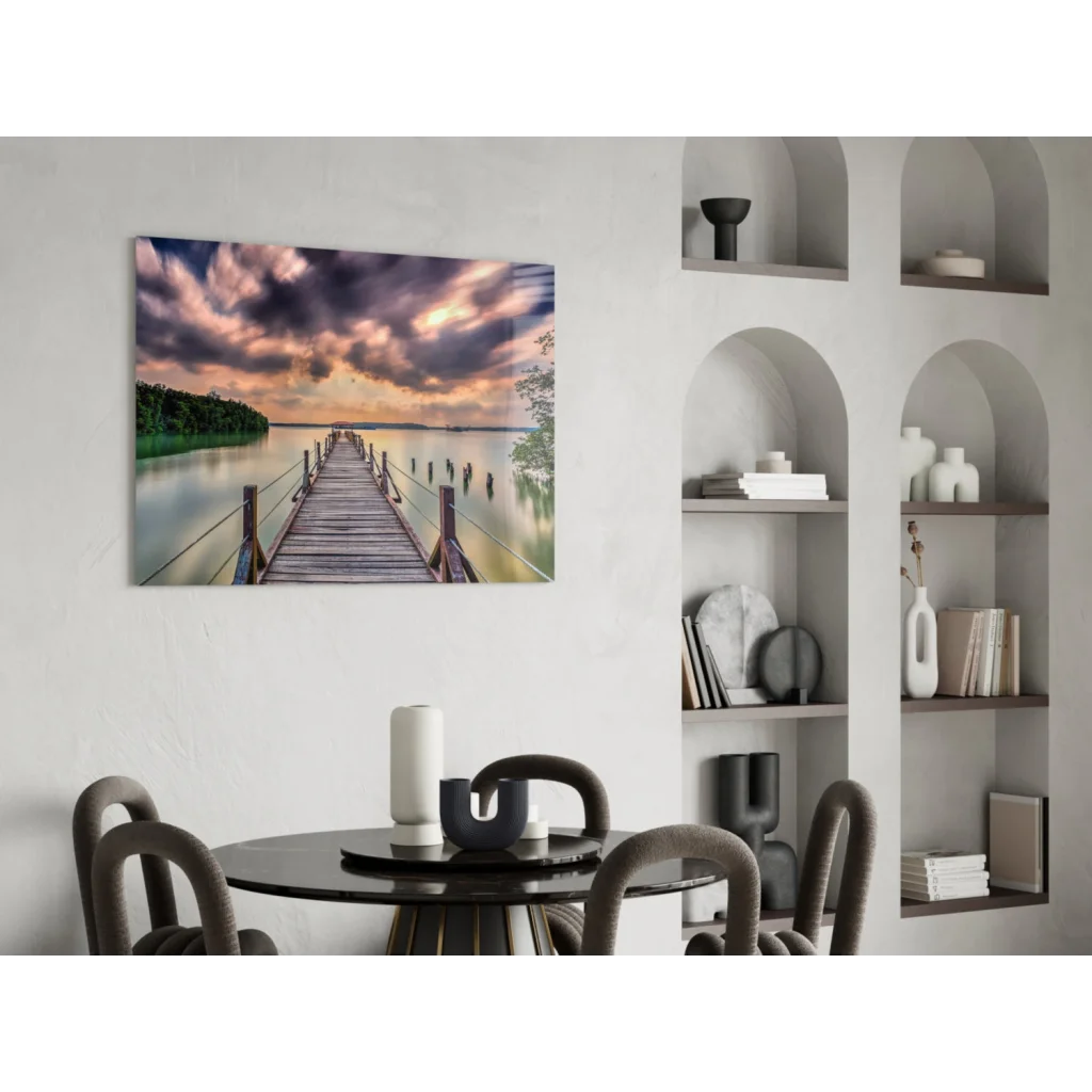 Stunning glass wall art of wooden pier in calm water under colorful sky
