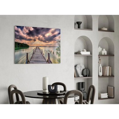 Stunning glass wall art of wooden pier in calm water under colorful sky