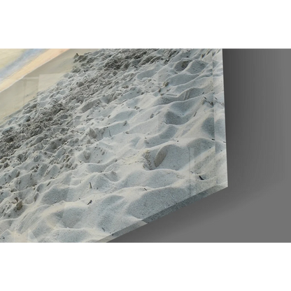 Stunning glass wall art of textured light gray sand dune