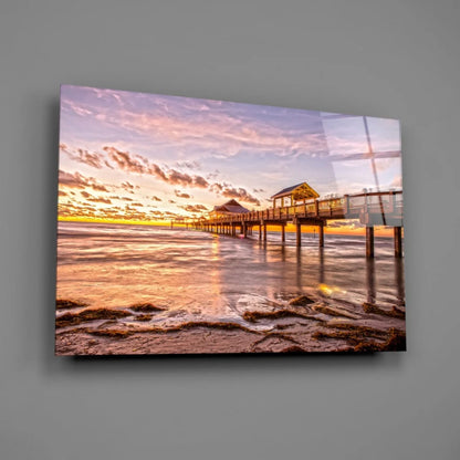 Vibrant sunset over wooden pier in glass wall art canvas print