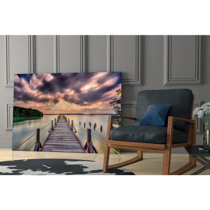 Stunning glass wall art of wooden pier over calm water with dramatic sky