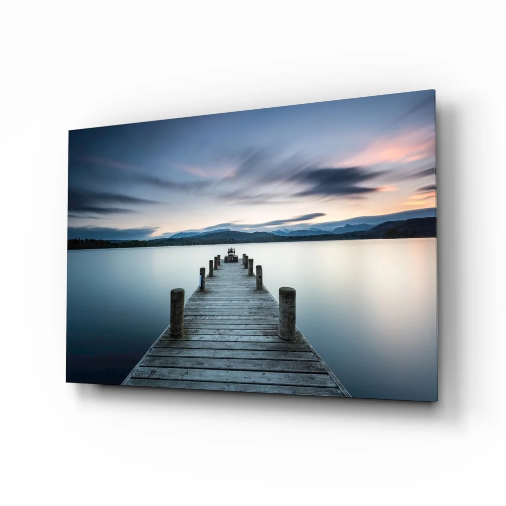 Serene twilight pier glass wall art print on calm waters dock