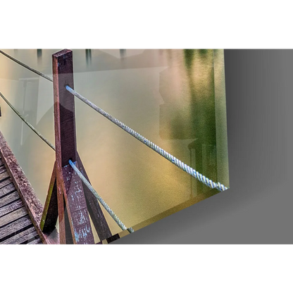 Weathered wooden bridge railing in glass wall art print