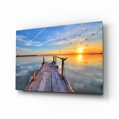 Sunset pier canvas wall art with flying birds over calm water