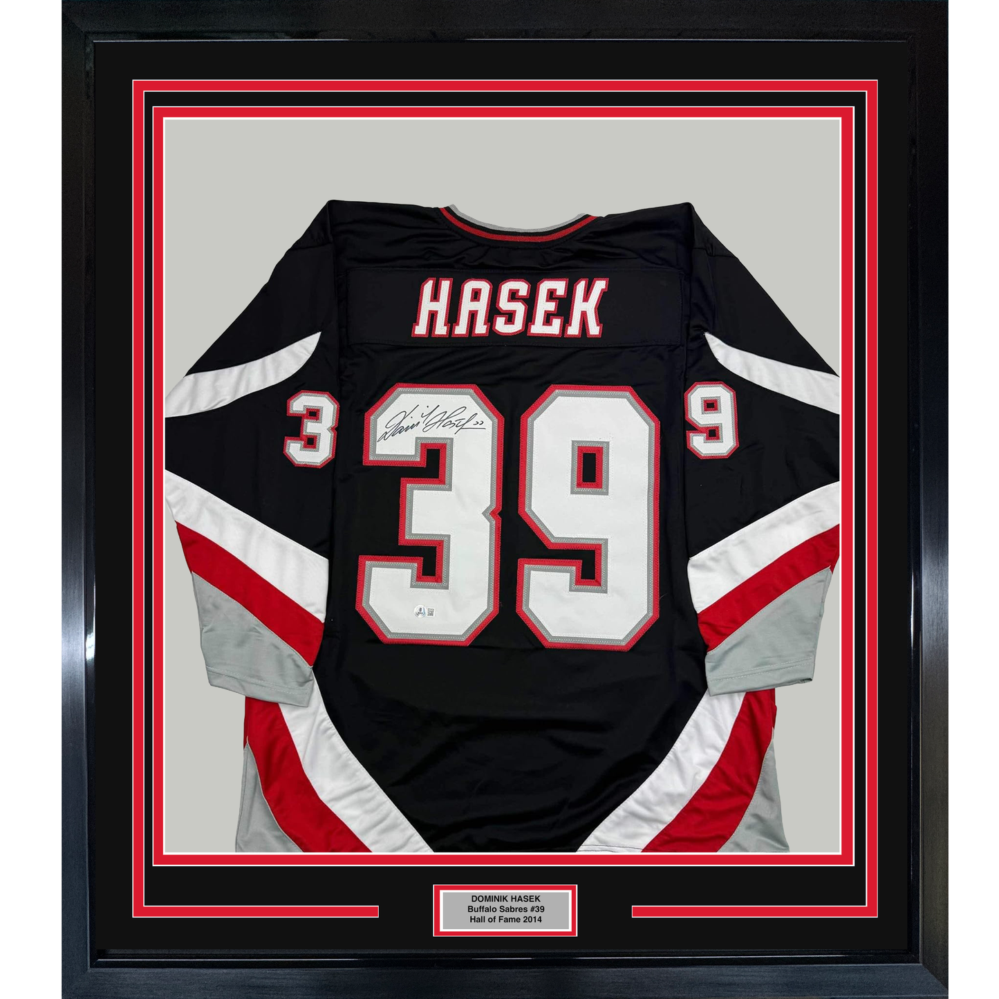 Framed Autographed/Signed Dominik Hasek 35x39 Buffalo Black Hockey Jersey Beckett BAS COA