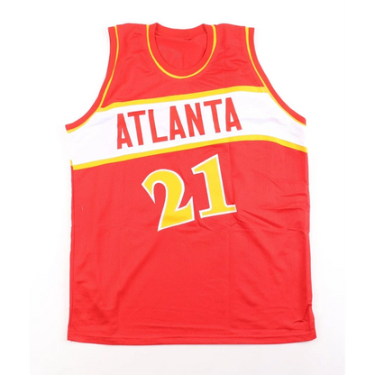 Red Atlanta basketball jersey with 21, signed by Dominique Wilkins with Schwartz Sports hologram