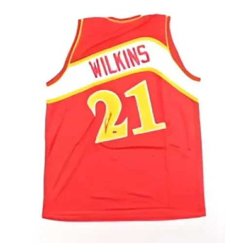 Signed Dominique Wilkins jersey with Schwartz Sports hologram and autographed Hawks gear