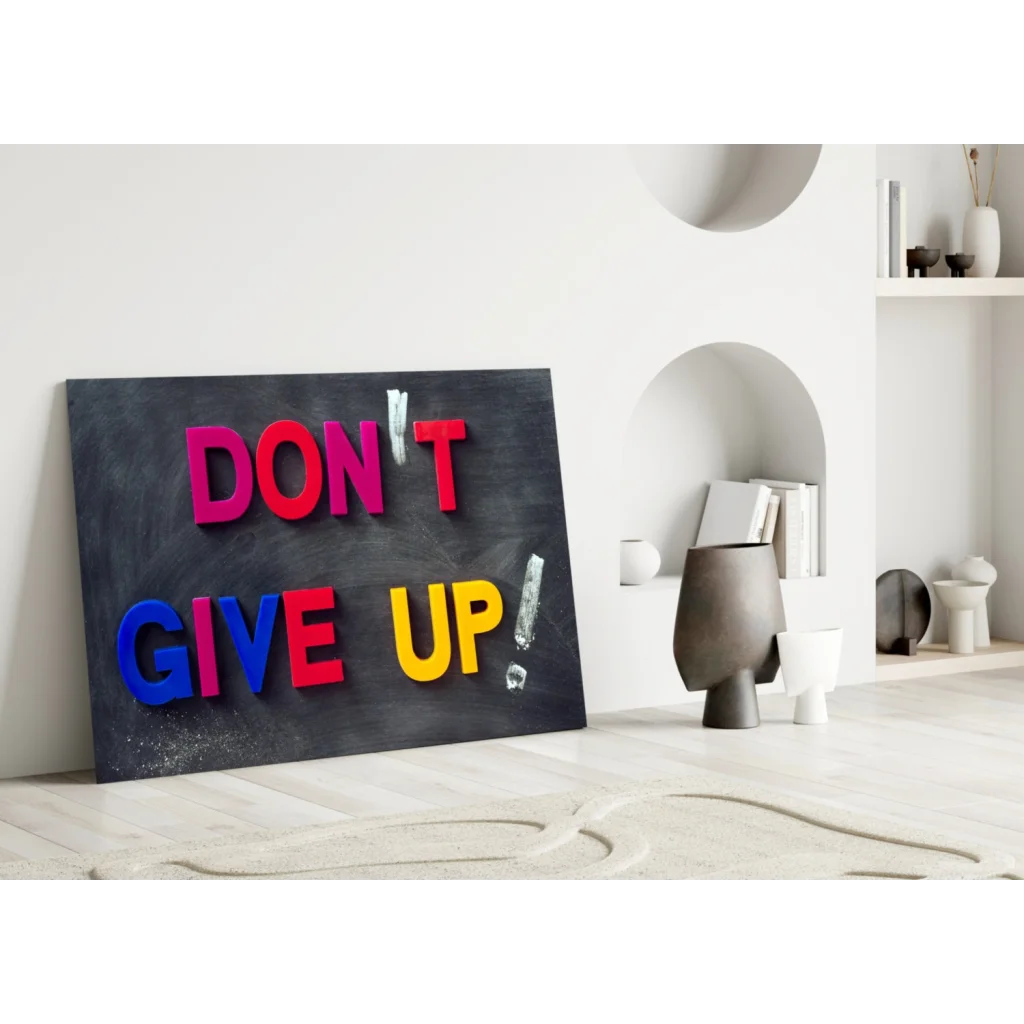 Vibrant 3D glass wall art Don’t Give Up sign in pink and blue on black