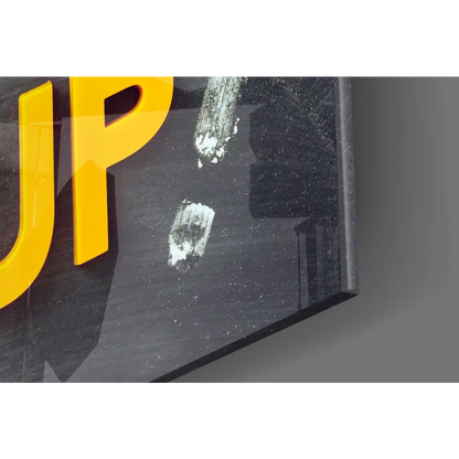 Glossy black 3D glass wall art sign with bold yellow Don’t Give Up lettering